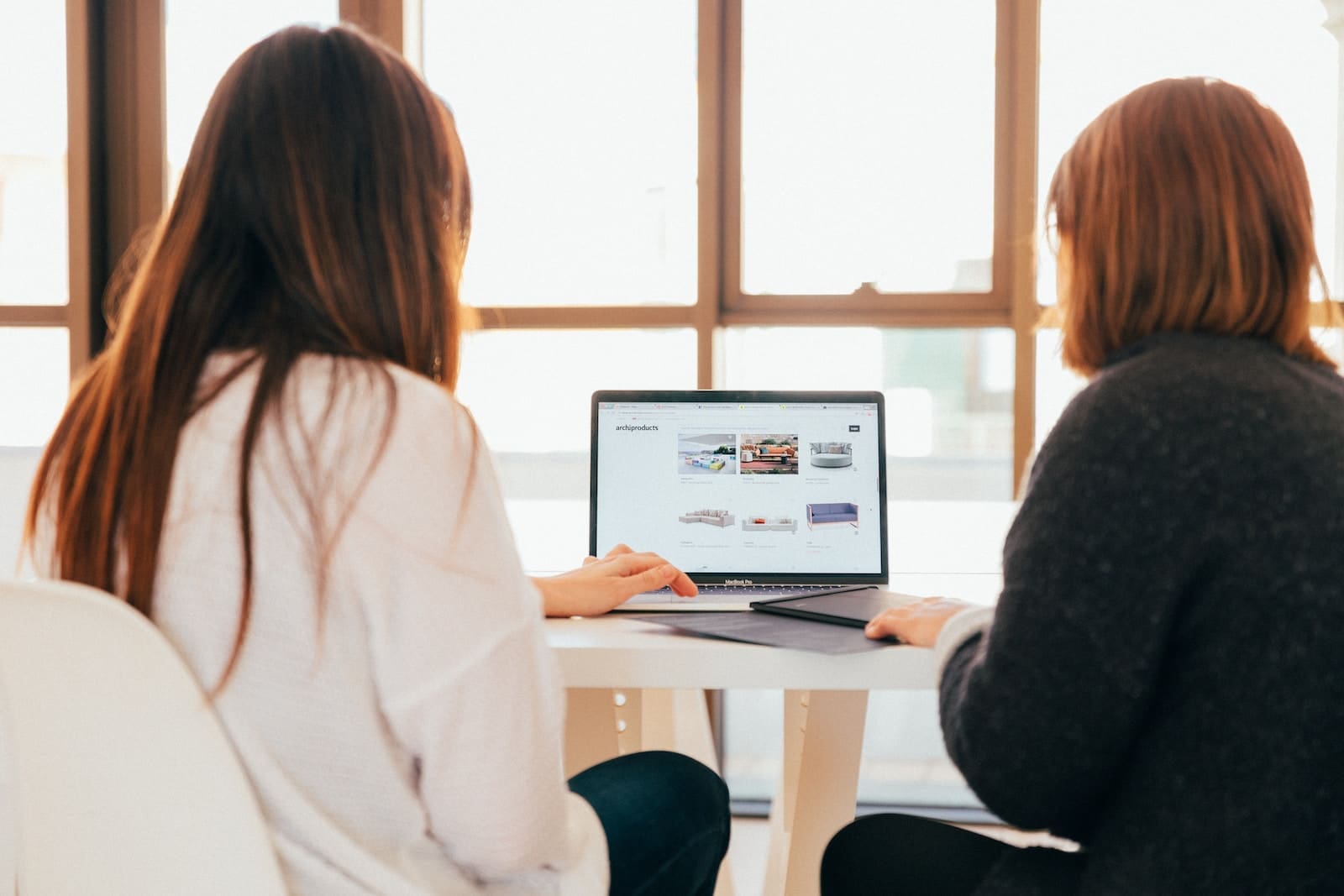 two women talking about hosting